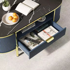 Table basse ovale 48 pouces - Table basse centrale cannelée moderne avec tiroir de rangement, plateau en faux marbre et pieds en métal doré pour salon
