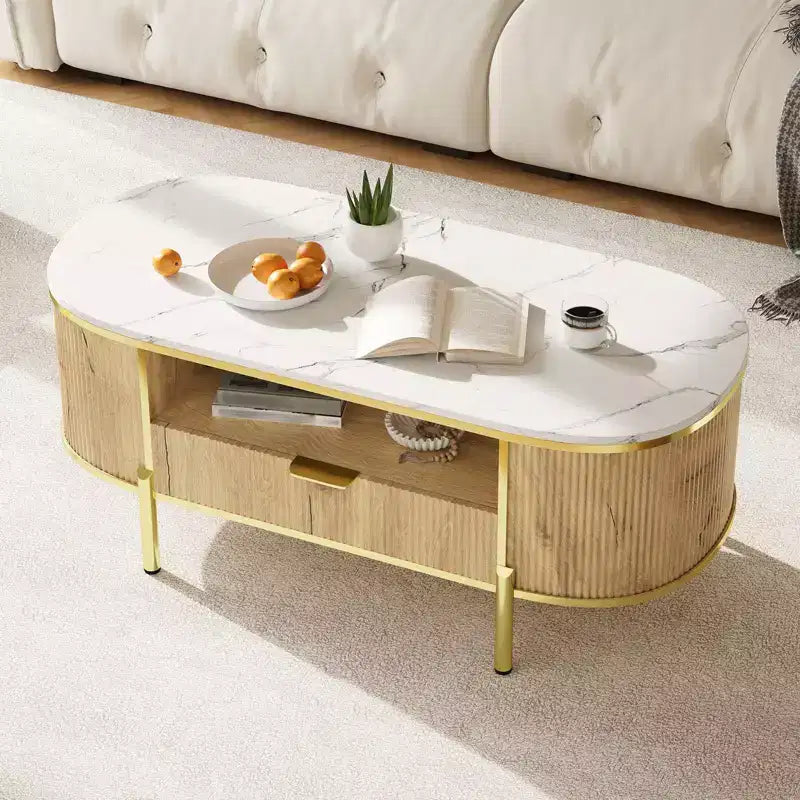 Table basse ovale 48 pouces - Table basse centrale cannelée moderne avec tiroir de rangement, plateau en faux marbre et pieds en métal doré pour salon