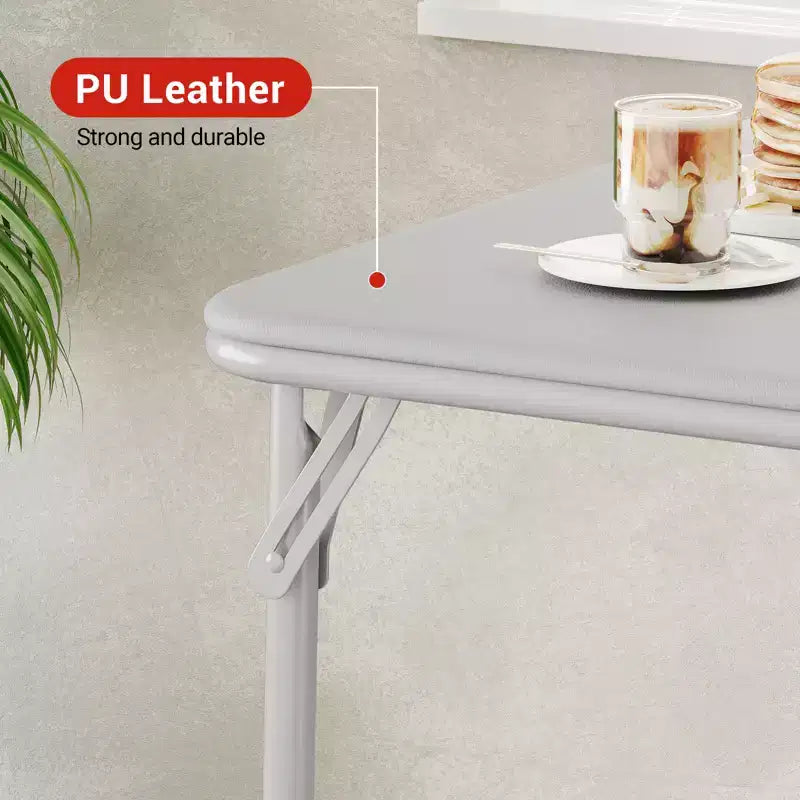 Table à manger pliable, table de jeu carrée portable de 84 cm, plateau rembourré en PU, idéale pour la famille, les fêtes, les pique-niques et les jeux.