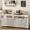 Four-door sideboard with grooved design Modern wood construction Ideal for dining rooms, living rooms, and entryways