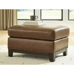 Signature Design by Ashley Brendola Ottoman, Top Grain Leather Cushion with Nailhead Trim, Amber