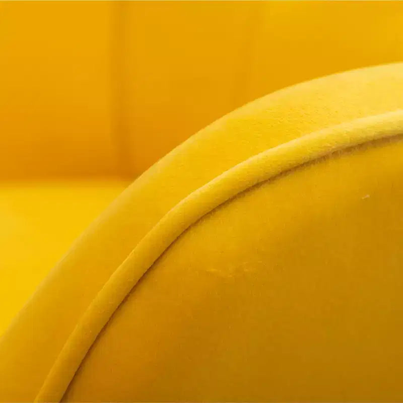 Fauteuil d'appoint capitonné en velours contemporain GDFStudio Valda avec dossier à oreilles et pouf