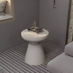 Table d'appoint ronde moderne sur pied LeisureMod Isle en pierre reconstituée