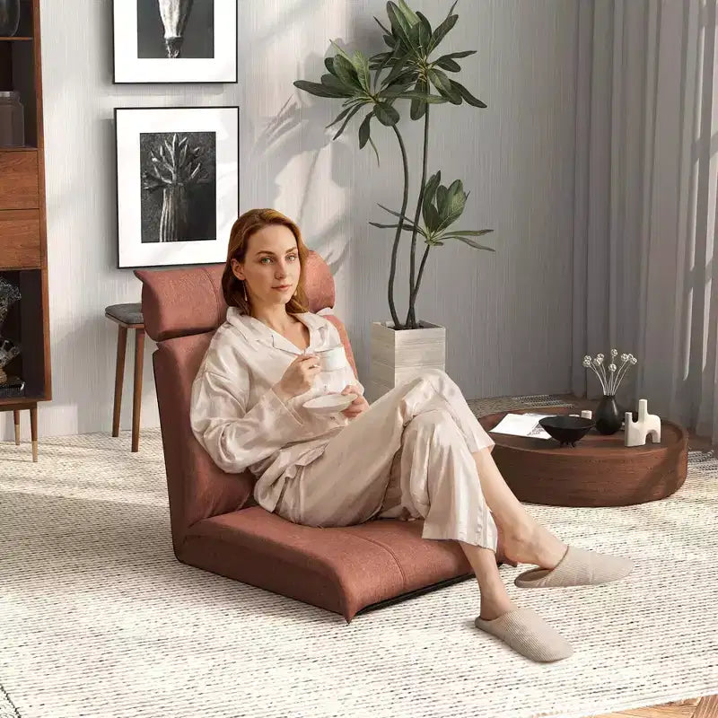 Chaise de sol pliable Costway avec dossier réglable sur 14 positions et appui-tête réglable